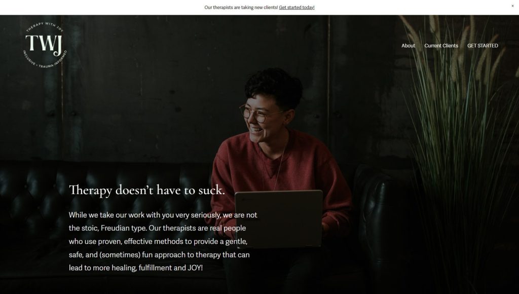 Portrait of Therapy with Joy, one of the therapist website examples with a full-width homepage header design.